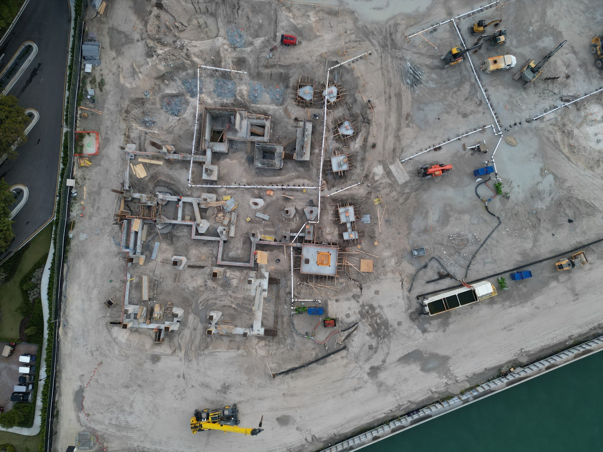 Building architecture under construction. Construction site from top. Structural design engineering. Structure engineering at building site. Formwork construction architecture. Architectural building